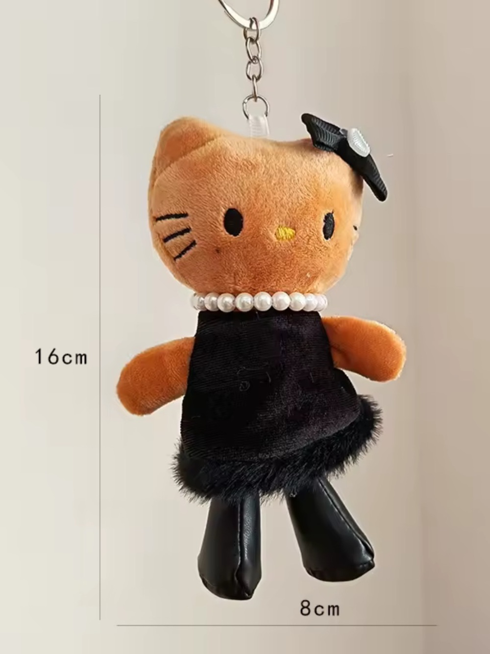 Hello Kitty Orange Plush Keychain with Black Dress and Pearl Collar